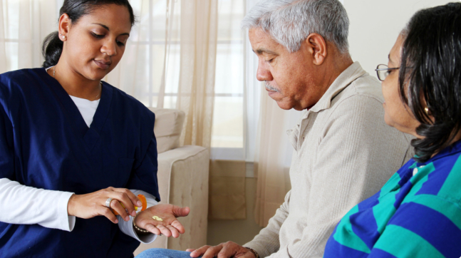 caregiver visiting the elder couple