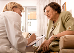 elder woman consulting to a medical specialist