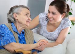 caregiver taking care of the elder lady